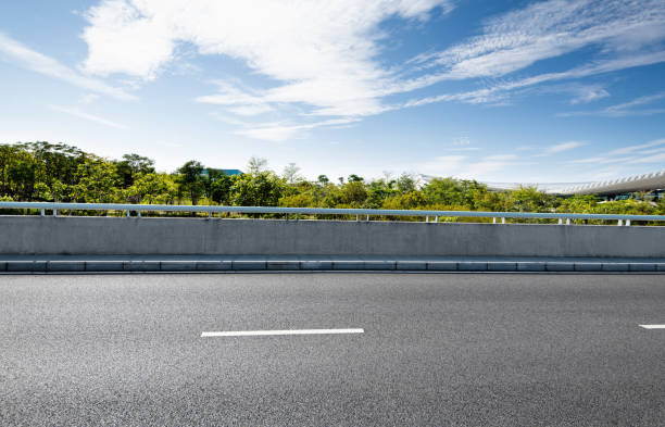 istock Asphalt road and roadside scenery 1193451564
