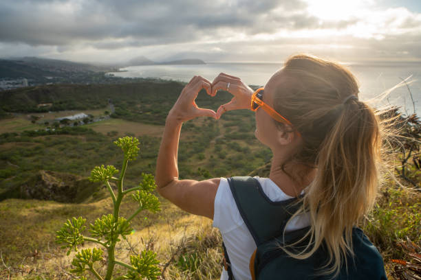 istock Young woman loving Hawaii 1193451926