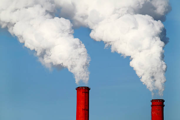 istock two red pipes and smoke 119345371