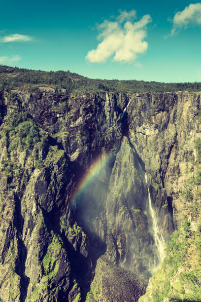 istock Voringsfossen waterfall with rainbow, Norway 1193454774