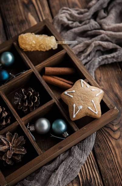 istock Wooden box with Christmas items and gingerbread. 1193454930