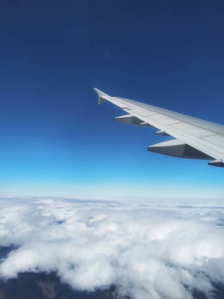istock Airfoil and Cloudy Blue sky 1193455139