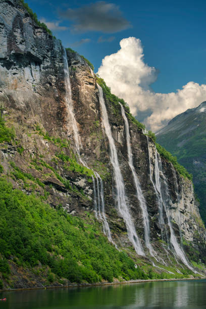 istock Waterfall over the Geiranger fjord 1193456477
