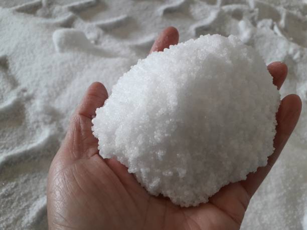 istock Hand and chemical fertilizer 1193457485