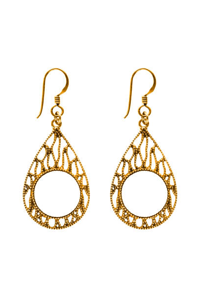 istock Gold earrings isolated 1193457834