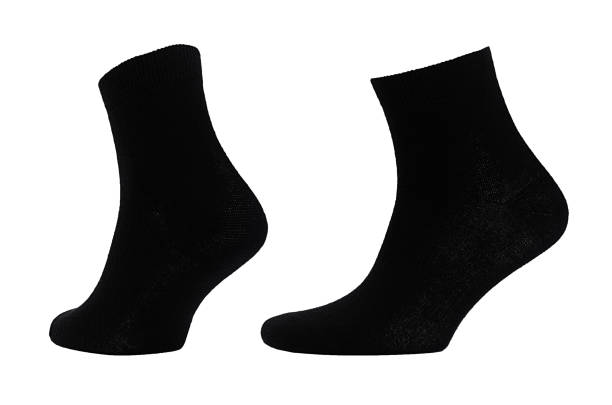 istock Blank black cotton medium socks on invisible foot isolated on white background as mock up for advertising, branding, design, front side, side view, template. 1193459683