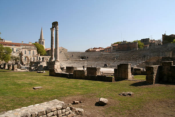 The Roman Amphitheater In The Old Town Of Arles In Provence In The South Of France.