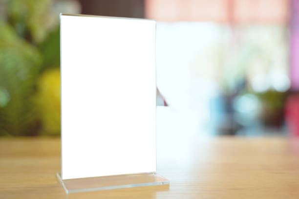 istock Mock up Menu frame standing on wood table in Bar restaurant cafe. space for text 1193463792