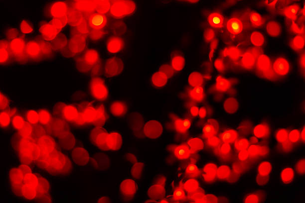 istock Bokeh red blurred lights abstract color background. 1193464529