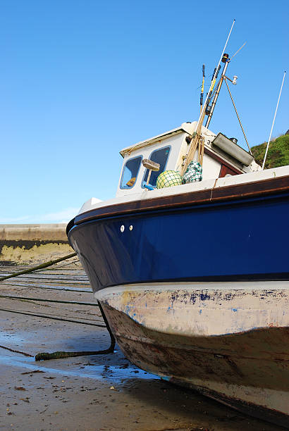 istock Fishing vessel in port, Cornwall, England 119347456