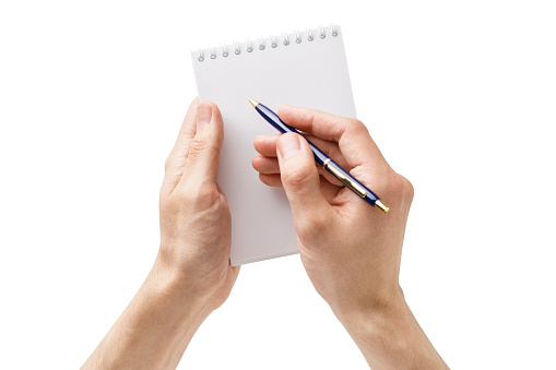 Male hands holding an open empty notebook and a pen. Man making notes or a to-do list. Isolated on white background.