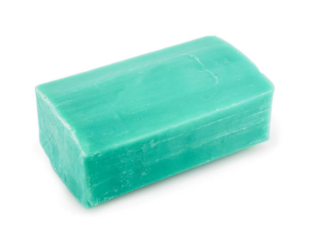 istock A piece of green soap on a white background 1193478021