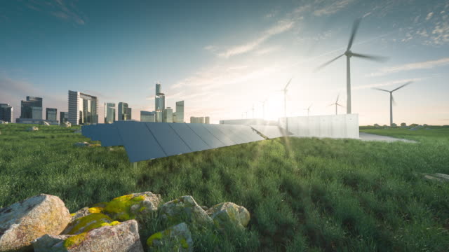 Future renewable energy solution for sustainable cities. Modern black frameless solar panels, battery energy storage facility, wind turbines and big city with skycrapers in background. 3d rendering.