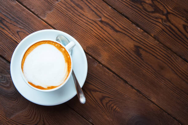 istock One cup of coffee on a wooden background. 1193483238