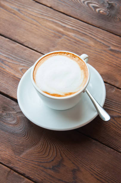 istock One cup of coffee on a wooden background. 1193483288