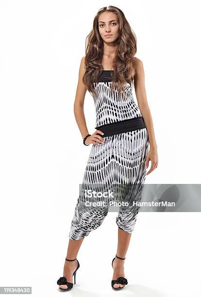 Young Pretty Lady In Harem Pants Fulllength Studio Portrait On Stock Photo - Download Image Now