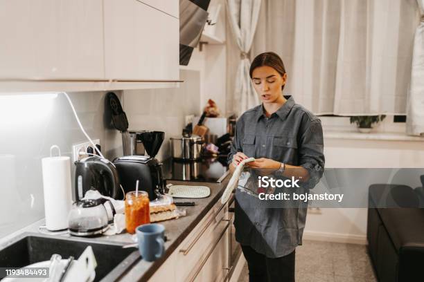 Young Woman In Kitchen Stock Photo - Download Image Now - 20-29 Years, Adult, Adults Only