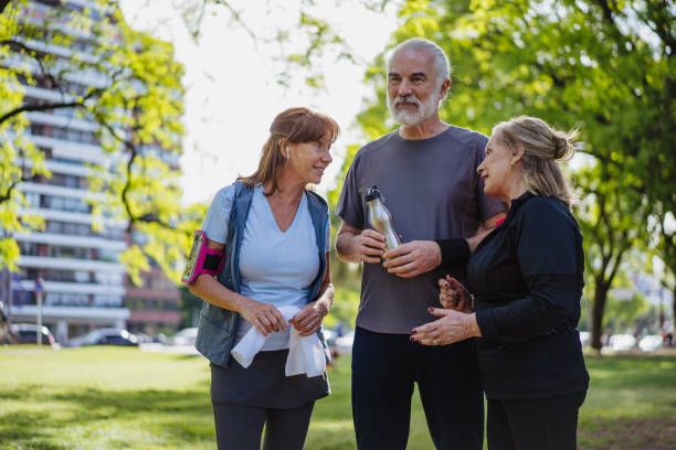 istock Senior friends are resting from training in park 1193485628