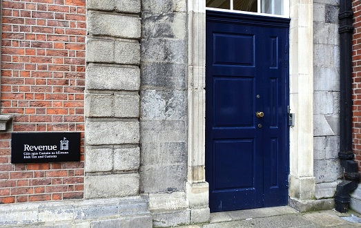 8th December 2019, Dublin, Ireland.  Entrance to The Revenue Irish Tax and Customs (or Cain Agus Custaim Na hEireann in Irish) office in Dublin Castle grounds off Dame Street.