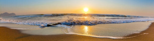 istock Dawn by the sea 1193487465