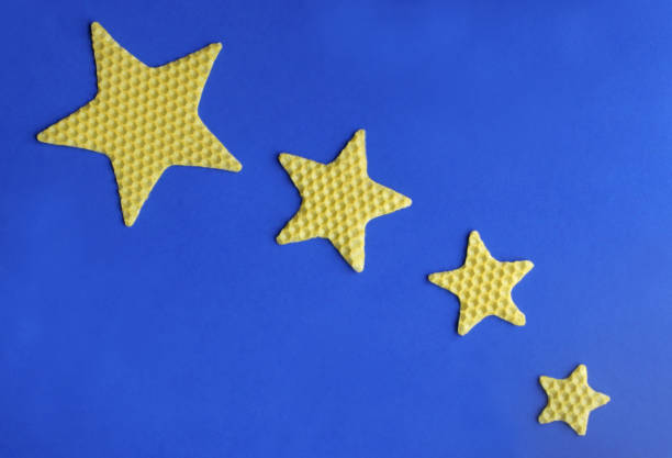 istock christmas background with small and large stars 1193488193