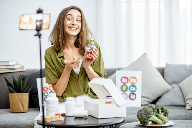 istock Woman vlogging about nutritional supplements 1193488876