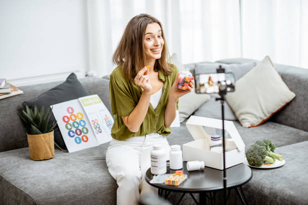 Woman vlogging about nutritional supplements