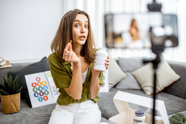 istock Woman vlogging about nutritional supplements 1193488900