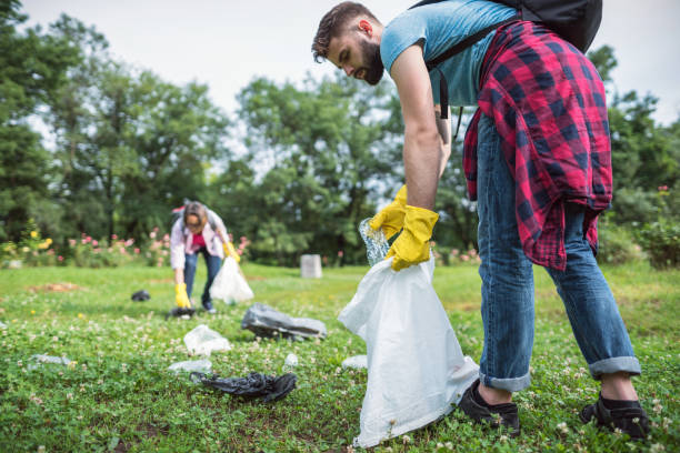 istock Responsible people cleaning up the park 1193489698