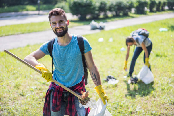 istock People volunteering in a cleaning community project 1193490233