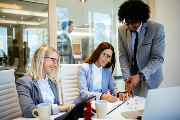 istock Team of young executives in a meeting 1193491168