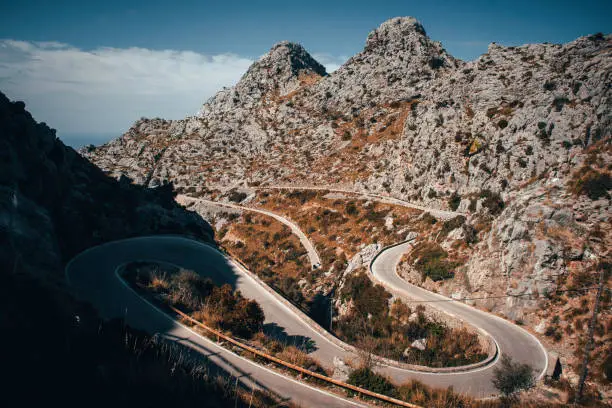 Photo of Sa Calobra Mallorca Road in mountains, favorite place for cyclist. Sport in nature