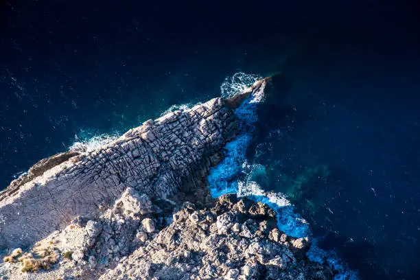 Photo of Rock shore of the sea. Aerial view.