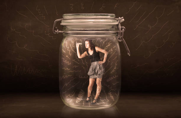 istock Businesswoman inside a jar with powerful hand drawn lines concept 1193494428