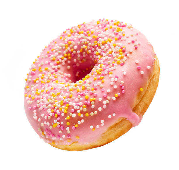 istock freshly baked donuts isolated on white background, selective focus 1193498723