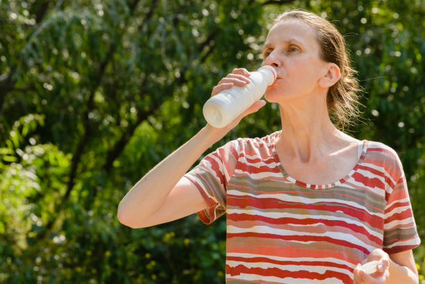 istock Senior Woman Drinking 1193499057