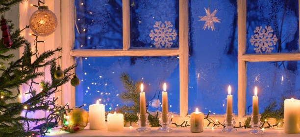istock Christmas decorations on old wooden window 1193503468