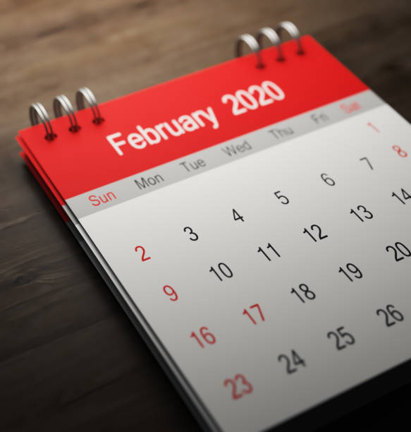 istock Red 2020 calendar on wooden background. 3D rendering 1193504214