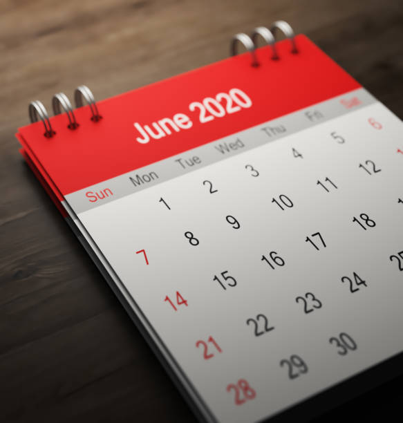 istock Red 2020 calendar on wooden background. 3D rendering 1193505090