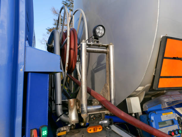 heating oil tanker making a home delivery, with hose reel and control panel - oil storage tank storage compartment fuel and power generation imagens e fotografias de stock