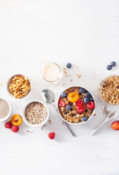 istock healthy granola for breakfast with berry fruit nut, plant milk 1193506340