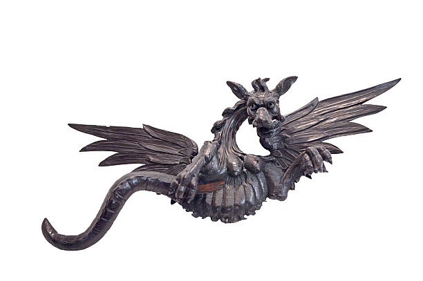 istock The ancient dragon cut out from a tree 119350679