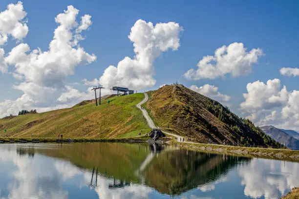 In the idyllic small reservoirs, water is collected throughout the year in order to be able to snow the popular ski slopes of the Leongang Ski World in winter