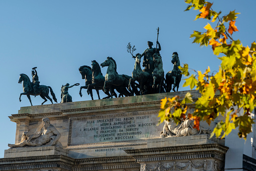 Milan, Italy - November 13, 2019: Milan, Lombardy, Italy: statues of the Arco della Pace at fall