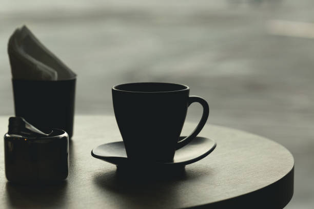 Cup of coffee on table at airport cafe