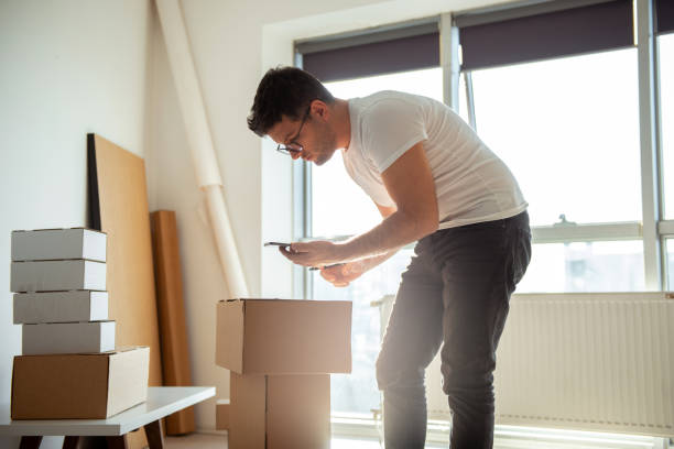 istock Delivery service, scanning a shipping label 1193513319