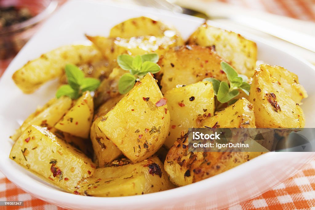 Roasted potato in white bowl  Baked Stock Photo