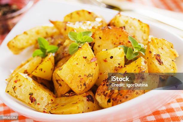Roasted Potato In White Bowl Stock Photo - Download Image Now - Baked, Baked Potato, Color Image