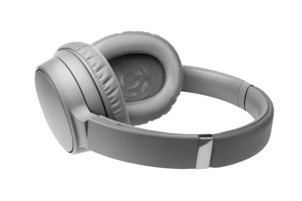 istock Gray wireless headphones on white background isolated close up, big grey bluetooth headset design, modern black wi-fi stereo sound earphones side view, high end audio music gadget, electronics device 1193516263