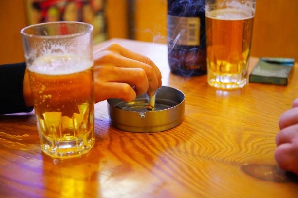 table bottle ashtray finger